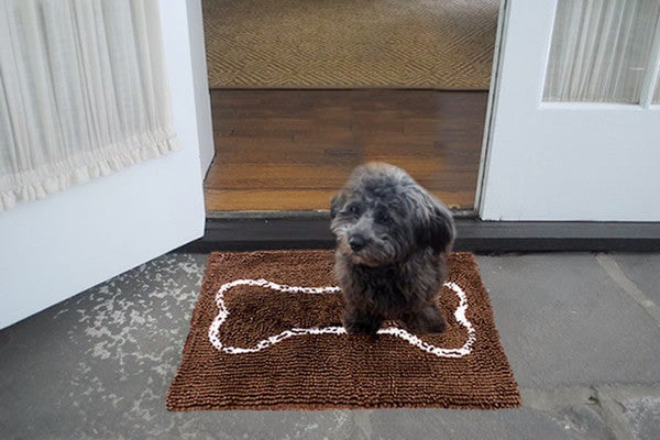 A Small Chocolate Doormat in use